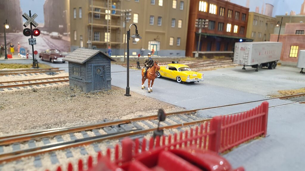 The grade crossing slitting the yard in two